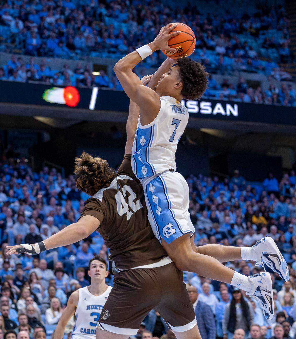 North Carolina’sSeth Trimble (7) drives to the basket against Lehigh’s J.T. Tan (42) in the second half on Sunday, November 12, 2023 at the Smith Center in Chapel Hill, N.C.