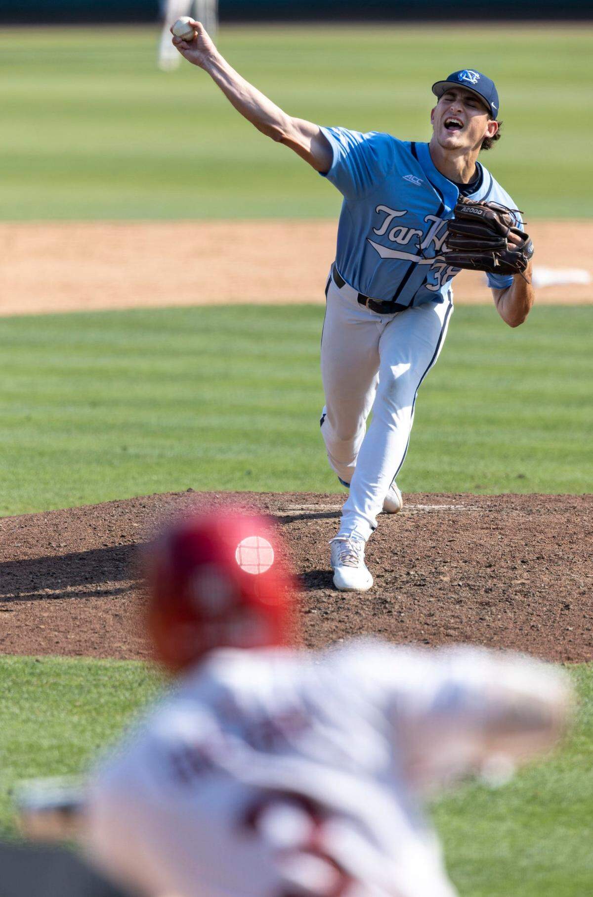 North Carolina pitcher David Palermo (38) works from the mound against Arkansas Zack Gregory (3) in the seventh inning in game two of their NCAA Super Regional series on Sunday, June 12, 2022 at Boshamer Stadium in Chapel Hill, N.C.