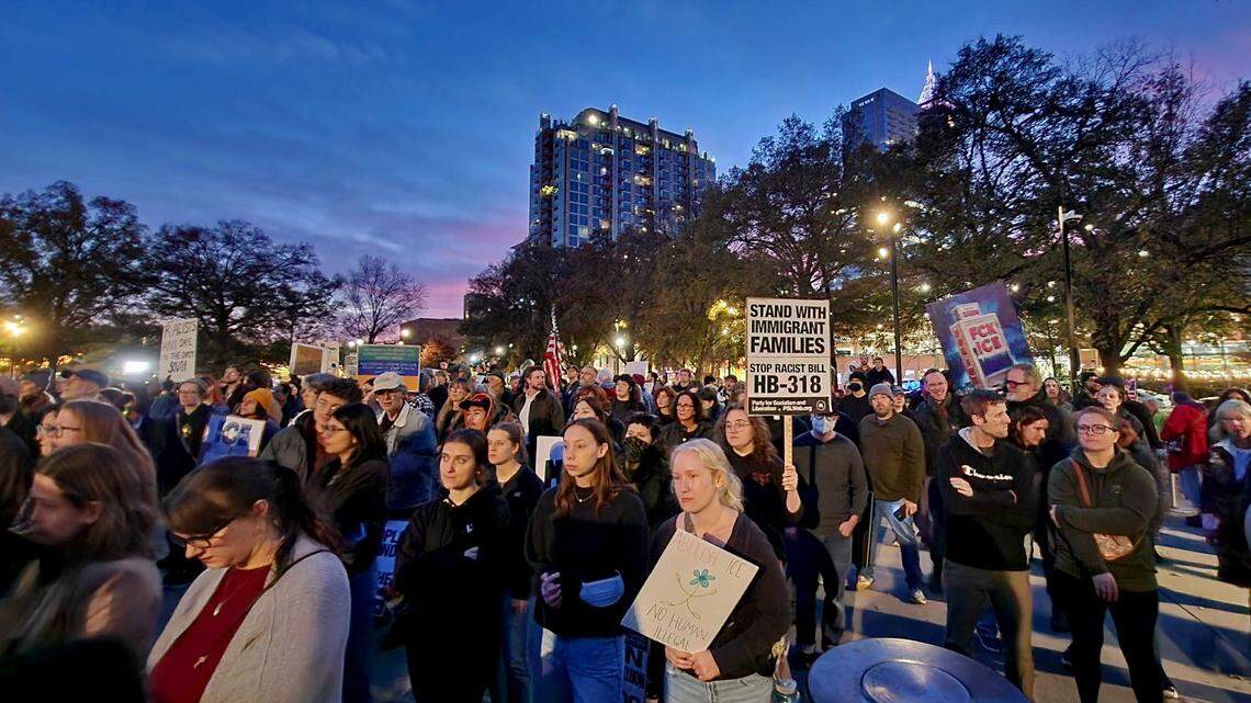 Hundreds rally in Downtown Raleigh’s Moore Square Tuesday night, Oct. 18, 2025, to protest Border Patrol agents making raids and arrests in the Triangle.