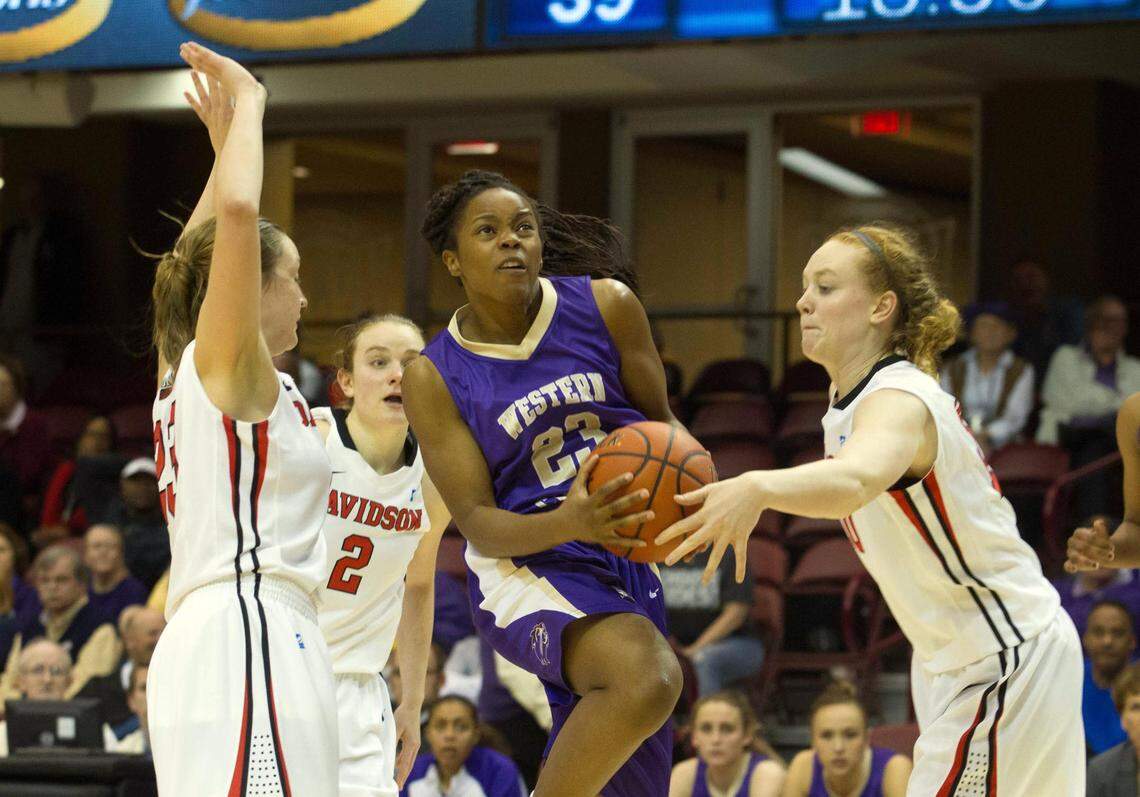 Mar 9, 2014; Asheville, NC, USA; Western Carolina Catamounts guard Rena Wakama (23) goes up for a shot during the second half against the Davidson Wildcats of the semifinals of the Southern Conference basketball tournament at Asheville Civic Center. Davidson defeated Western 74- 67.
