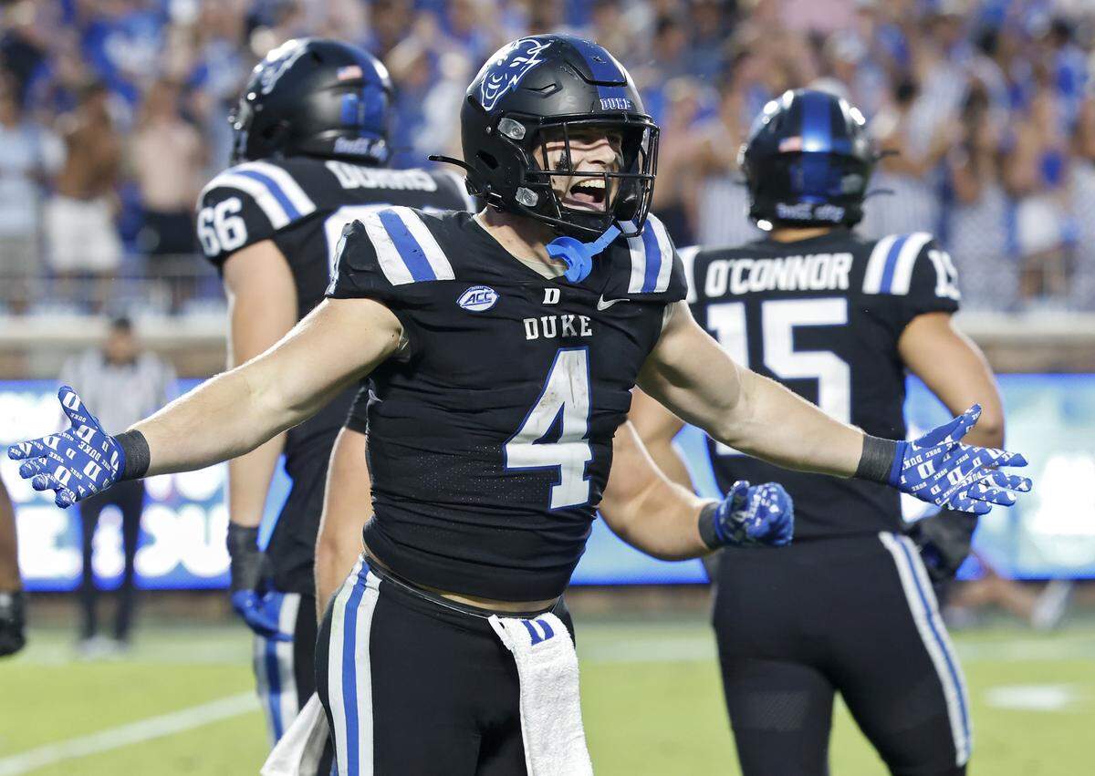 Duke’s Anderson Castle celebrates after scoring a touchdown late in the fourth quarter of the Blue Devils’ 45-33 win over N.C. State on Saturday, Sept. 20, 2025, at Wallace Wade Stadium in Durham, N.C.