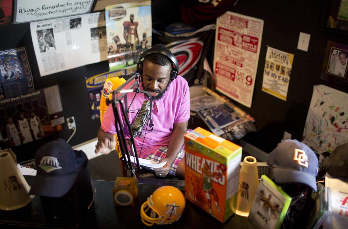 BOXTOROW radio show host Donal Ware interviews actress and model Eva Marcille in his studio office in his Fuquay-Varina, N.C. home on Tuesday, July 28, 2015.