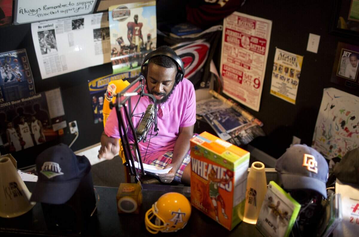BOXTOROW radio show host Donal Ware interviews actress and model Eva Marcille in his studio office in his Fuquay-Varina, N.C. home on Tuesday, July 28, 2015.