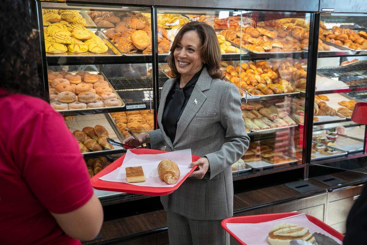 Vice President Kamala Harris makes a stop at Panadería Artesanal, a Latina-owned bakery, and talks with owner Jessica Karina Barahora as she purchases bread and pastries on Monday, January 30, 2023 in Raleigh, N.C.