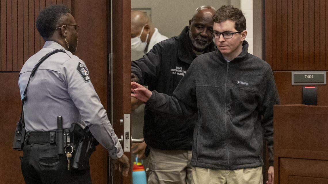 Austin Thompson, 18, is escorted into Wake County Superior Court following a recess during his sentencing hearing on Feb. 12. 