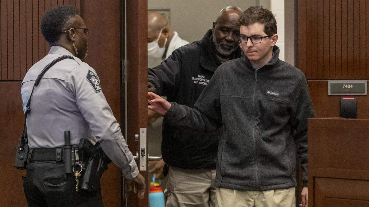 Austin Thompson, 18, is escorted into Wake County Superior Court following a recess during his sentencing hearing on Thursday, Feb. 12, 2026. Thompson pleaded guilty to the 2022 Hedingham neighborhood mass shooting in Raleigh that killed five people.