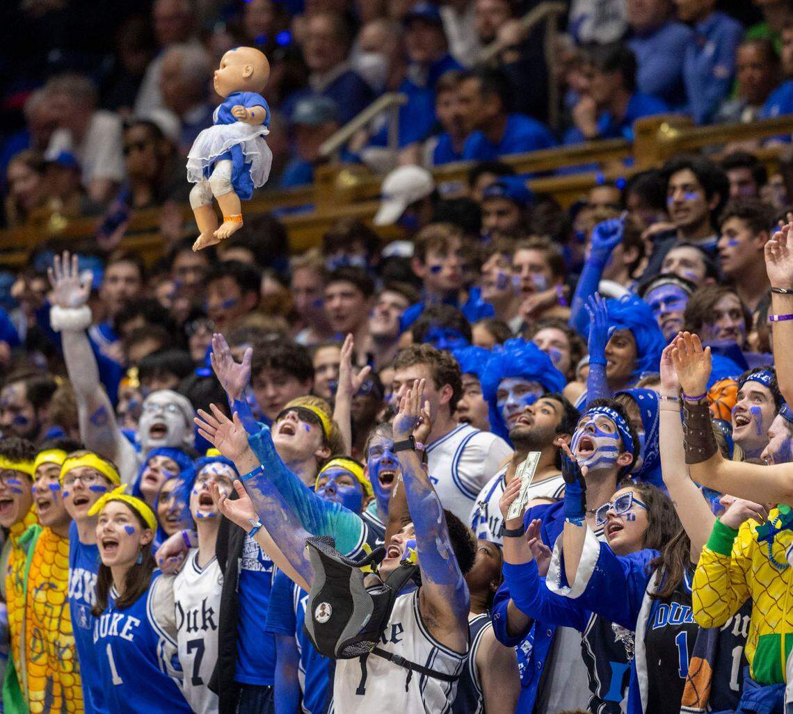 Duke’s ‘Cameron Crazies’ toss their baby doll into the air during a time-out of the North Carolina game on Saturday, February 1, 2025 at Cameron Indoor Stadium in Durham, N.C.