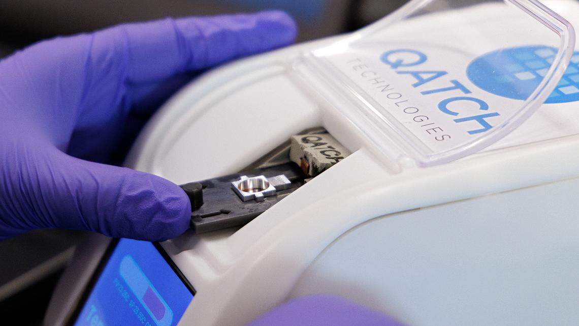 Zehra Parlak, founder of Qatch Technologies, works in the company’s laboratory space to test sensors used to measure the viscosity of drugs on Friday, Dec. 8, 2023, in Durham, N.C. Qatch is a past recipient of National Institutes of Health grants.