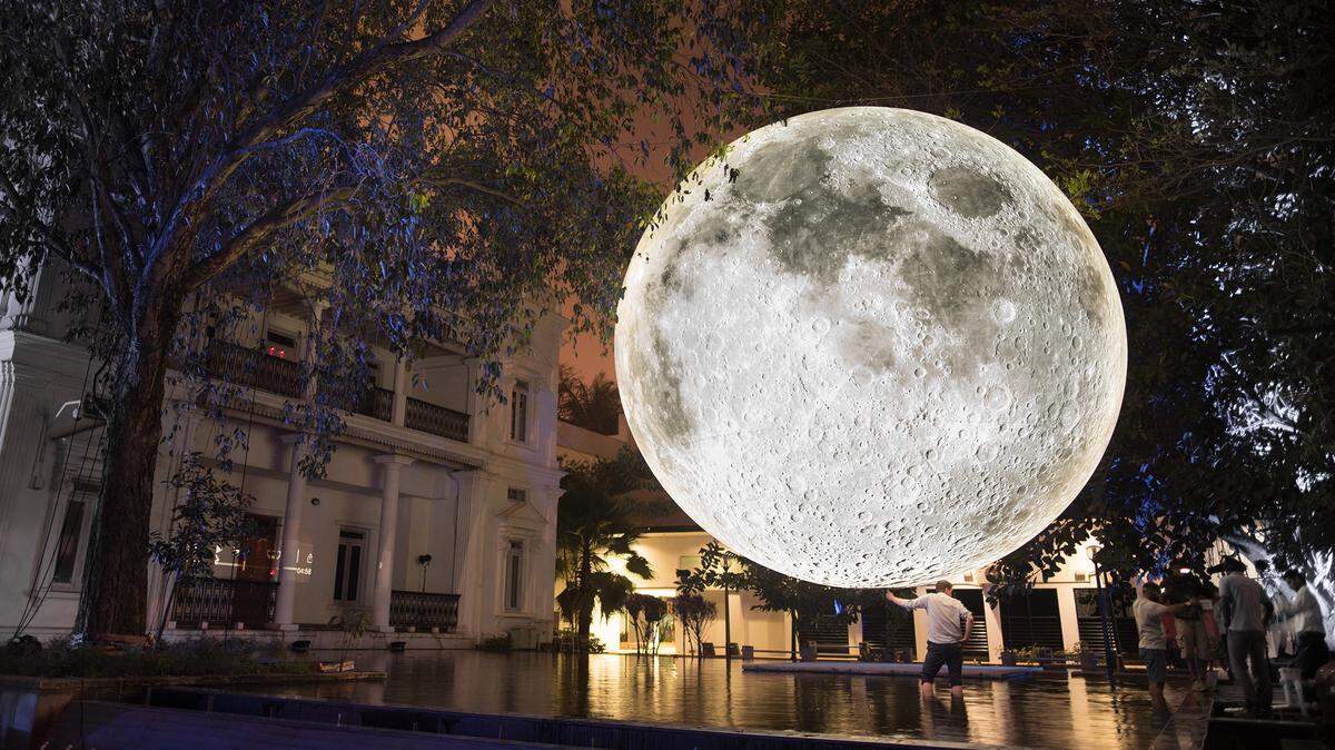 Museum of the Moon, a traveling giant moon by artist Luke Jerram, will hang in downtown Durham Oct. 31 to Nov. 3. Here it hangs in Bangalore, India.