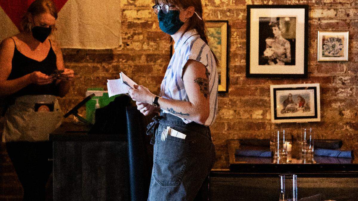 A restaurant worker in downtown Raleigh.