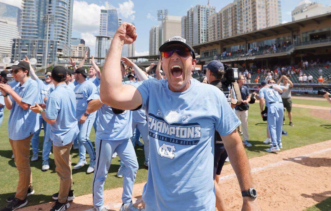 North Carolina head coach Scott Forbes looks to the fans and celebrates after UNC’s 9-5 victory over N.C. State in the ACC baseball championship at Truist Field in Charlotte, N.C., Sunday, May 29, 2022.