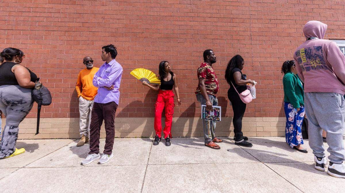 Lines like this one outside the DMV office on New Bern Avenue in Raleigh are common in the Triangle and Charlotte areas.