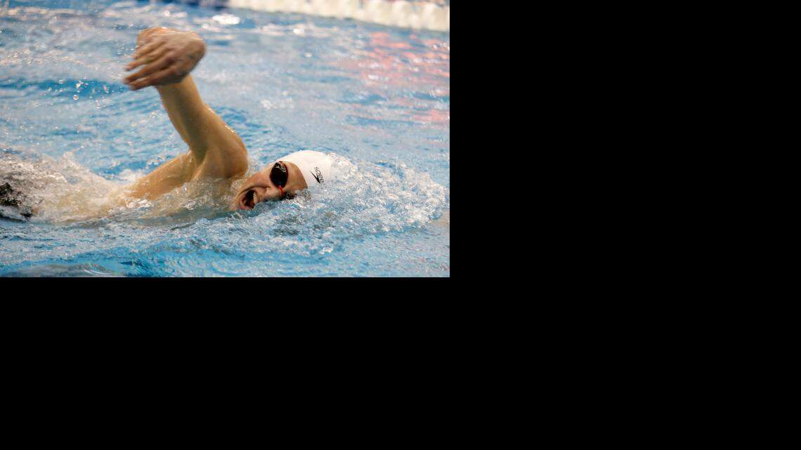 Cary’s Justin Ress competes in the 500 yard freestyle during last year’s NCHSAA 4A State Championships of swimming in Cary.
