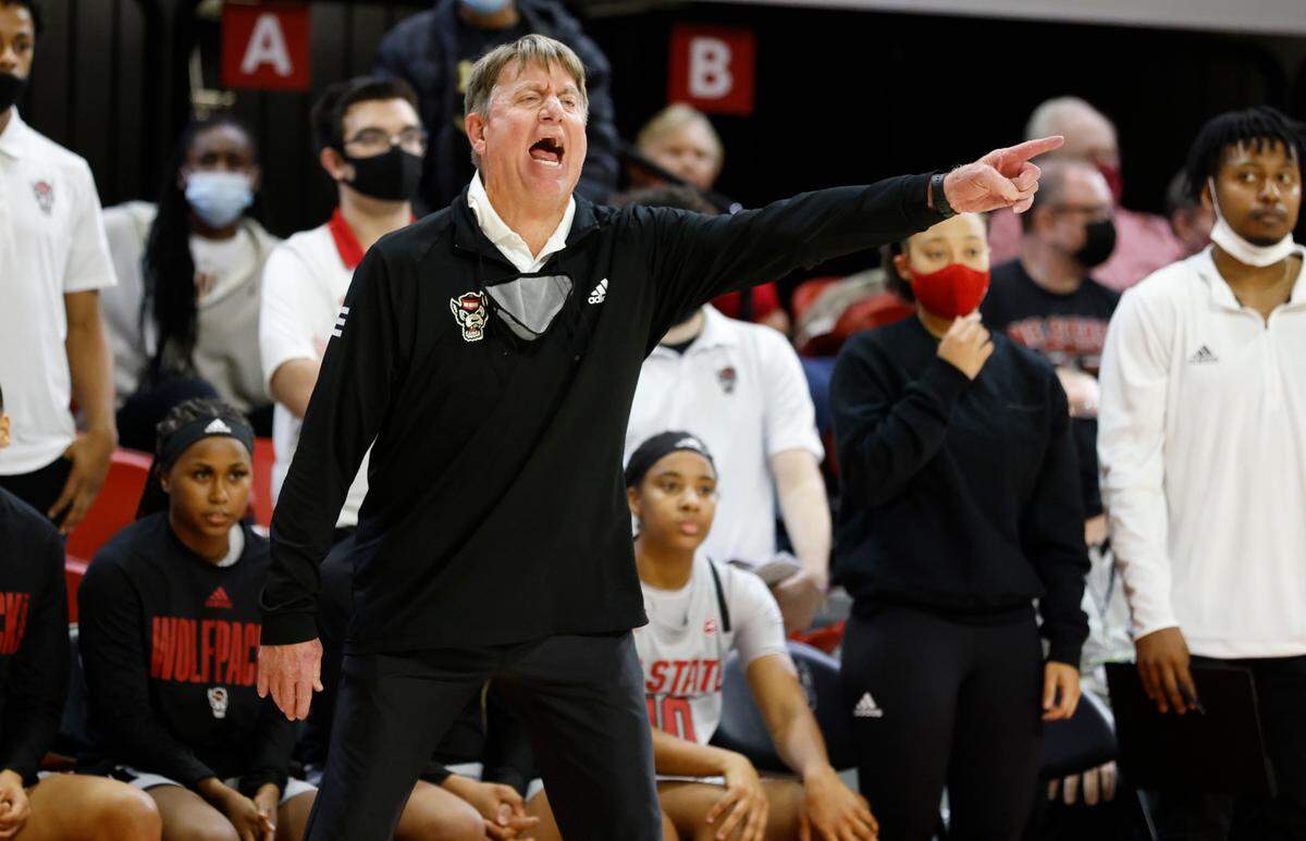 N.C. State head coach Wes Moore yells to his team during Georgia’s 82-80 overtime victory over N.C. State at Reynolds Coliseum in Raleigh, N.C., December 16, 2021.
