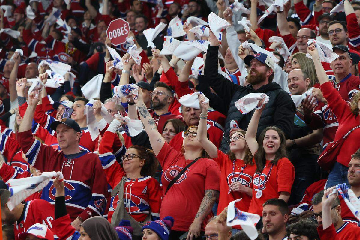 Fans cheer in Game 3 of the Eastern Conference Final of the 2026 Stanley Cup Playoffs between the Carolina Hurricanes and the Montréal Canadiens at Bell Centre on May 25, 2026 in Montreal, Quebec, Canada.