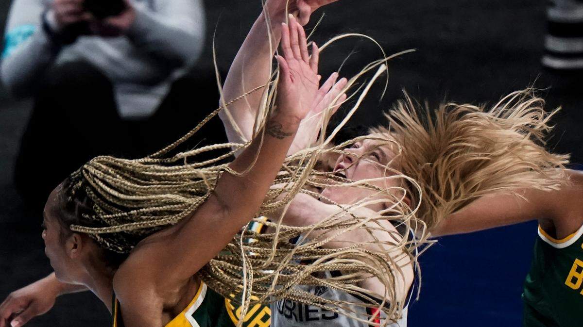 Baylor’s DiJonai Carrington shoots past UConn’s Paige Bueckers during the second half of an NCAA college basketball game in the Elite Eight round of the Women’s NCAA tournament Monday, March 29, 2021, at the Alamodome in San Antonio. 