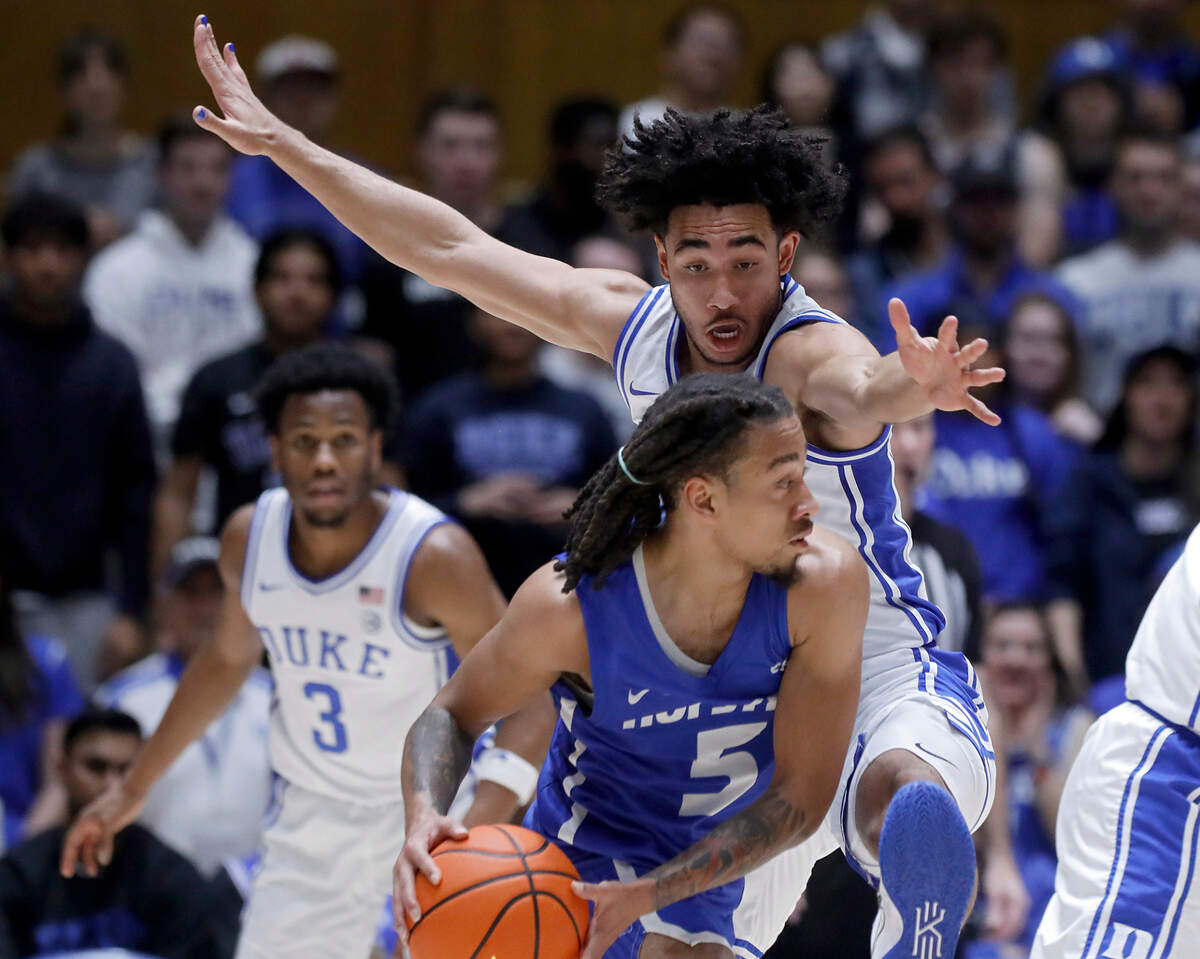 Duke’s Jared McCain defends Hofstra’s Jaquan Carlos during the first half of the Blue Devils’ game on Tuesday, Dec. 12, 2023, at Cameron Indoor Stadium in Durham, N.C.