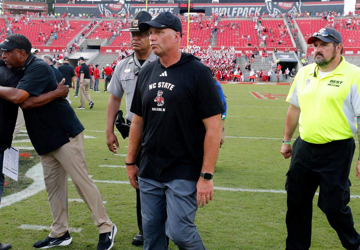 N.C. State head coach Dave Doeren walks off the field after Wake Forest’s 34-30 victory over N.C. State at Carter-Finley Stadium in Raleigh, N.C., Saturday, Oct. 5, 2024.