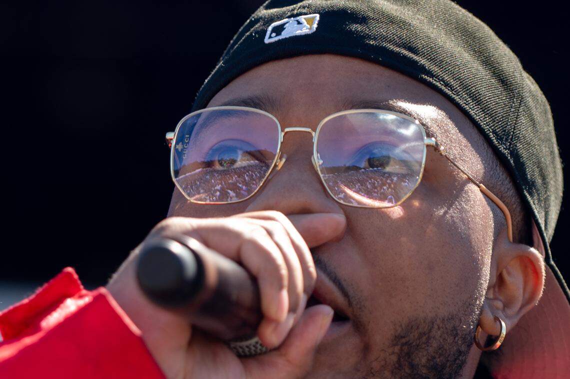 The crowd reflects in Cozz’s glasses during his performance at the second day of the Dreamville music festival at Dix Park in Raleigh, N.C. on Sunday, April 7, 2024.