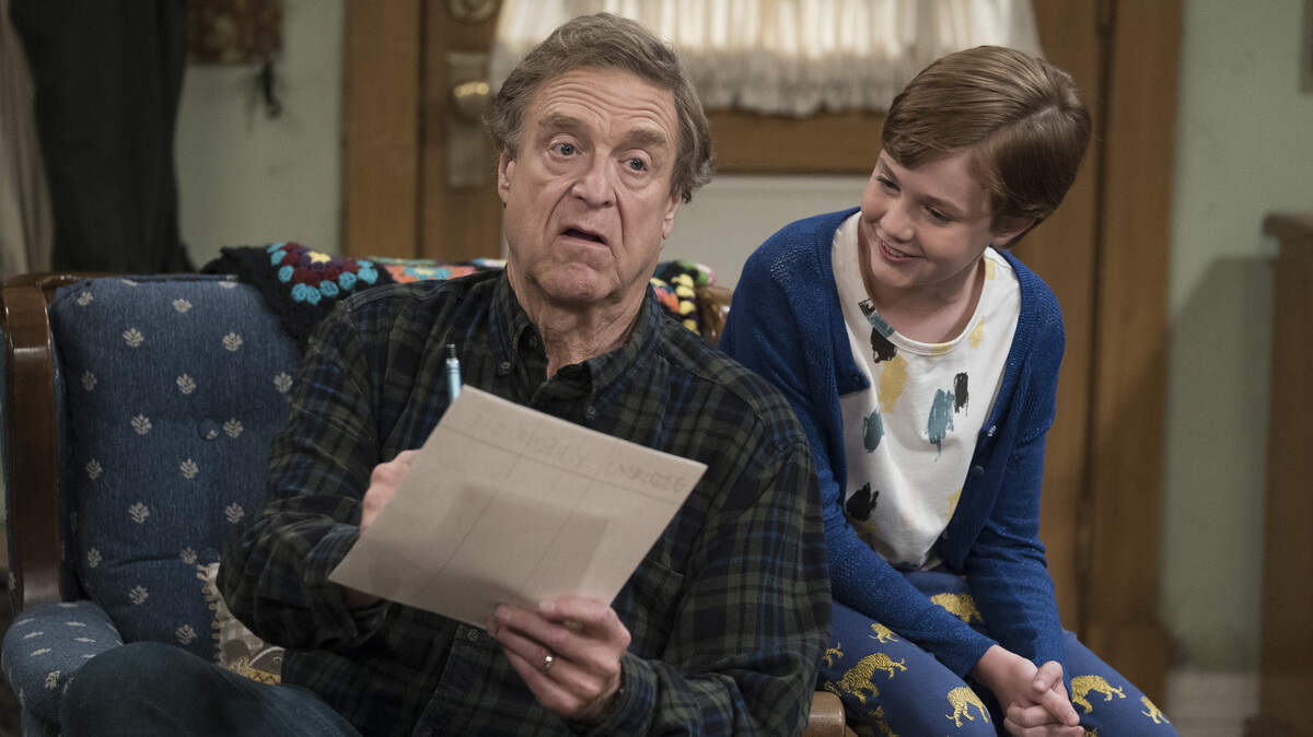 In the Oct. 30 episode of “The Conners,” Dan (John Goodman, left) argues with Darlene over an email from school banning certain Halloween costumes, including Mark’s (Ames McNamara, right).