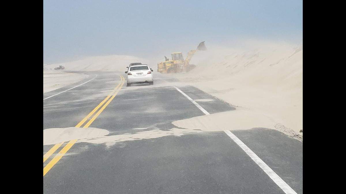 NC 12 on the Outer Banks is experiencing gale conditions as winds send sand across the pavement, according to the NC Department of Transportation.