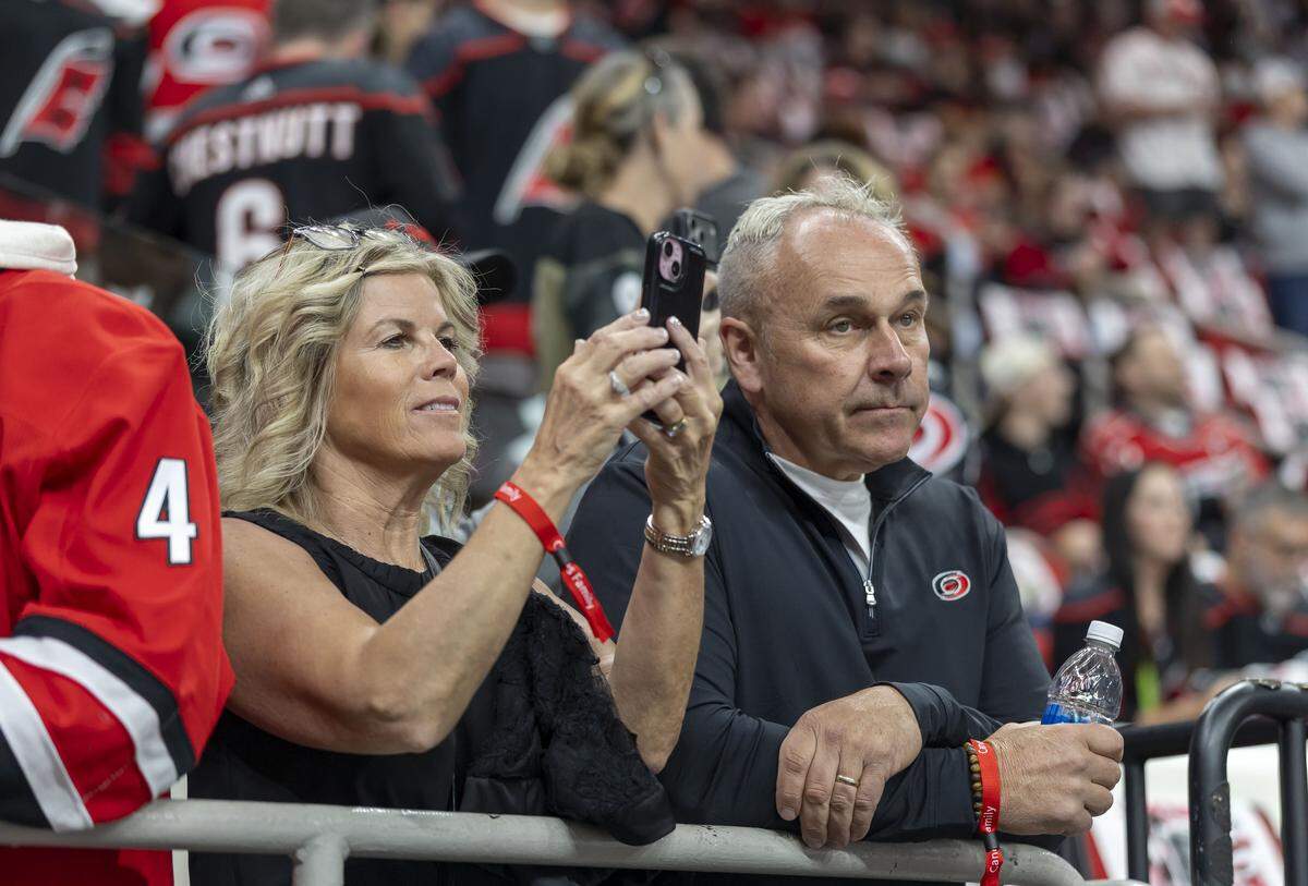 Deana and Wes Stankoven, the parents of Carolina Hurricanes center Logan Stankoven, watch their son during the pre-game skate prior to Game 1 of the Stanley Cup Finals, on Tuesday, June 2, 2026 at Lenovo Center in Raleigh, N.C.