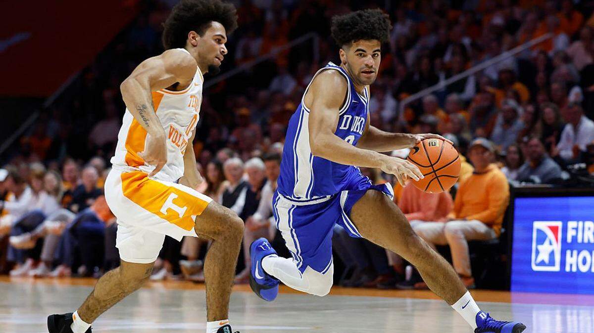 Cayden Boozer (2) of the Duke Blue Devils dribbles the ball against Ja’Kobi Gillespie of the Tennessee Volunteers during the first half at Thompson-Boling Arena on October 26, 2025 in Knoxville, Tennessee.