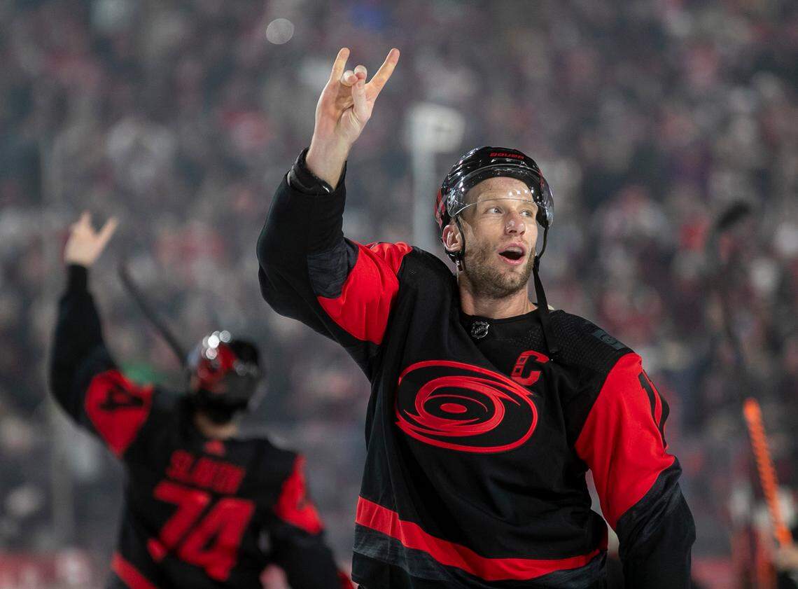 Carolina Hurricanes’ Jordan Staal (10) acknowledges fans with the Wolfpack sign, as he leaves the ice following their 4-1 victory over the Washington Capitals in the Stadium Series game on Saturday, February 18, 2022 at Carter-Finley Stadium in Raleigh, N.C.