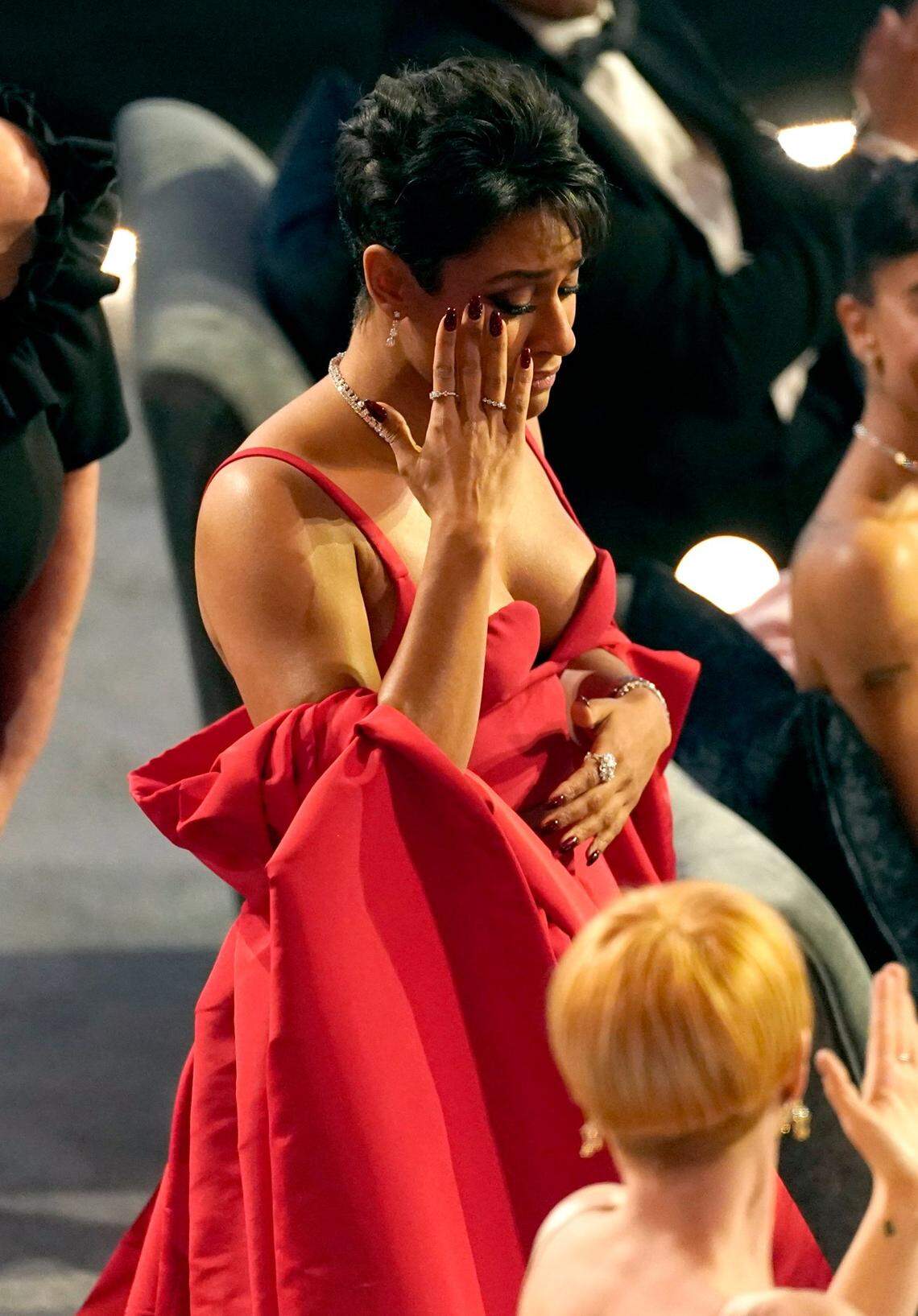 Ariana DeBose reacts in the audience as she is announced winner for best performance by an actress in a supporting role for “West Side Story” at the Oscars on Sunday, March 27, 2022, at the Dolby Theatre in Los Angeles.
