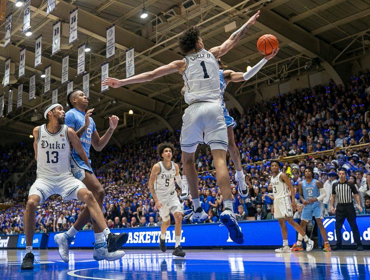 Duke’s Dereck Lively II (1) defends North Carolina’s R.J. Davis (4) in the second half on Saturday, February 4, 2023 at Cameron Indoor Stadium in Durham, N.C.