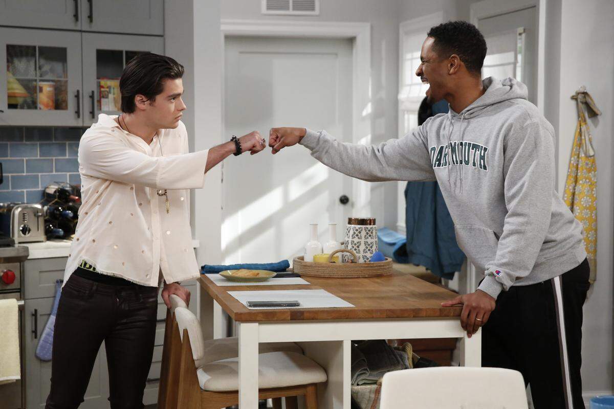 Damon Wayans Jr., right, starred in CBS’ ”Happy Together.” He will bring his standup act to Improv Raleigh.