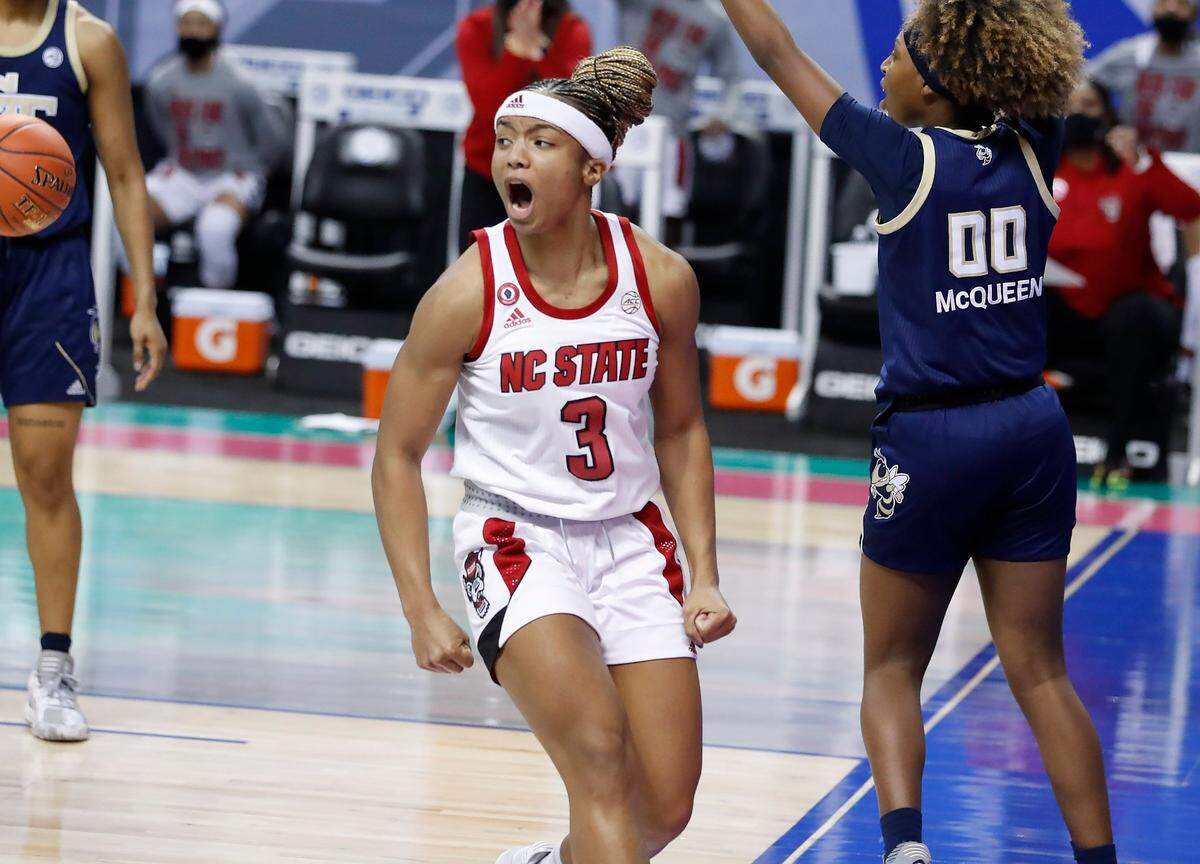 N.C. State’s Kai Crutchfield (3) celebrates after making the shot while being fouled during the second half of N.C. States 66-61 victory over Georgia Tech in the semifinals of the ACC Womens Basketball Tournament in Greensboro, N.C., Saturday, March 6, 2021.