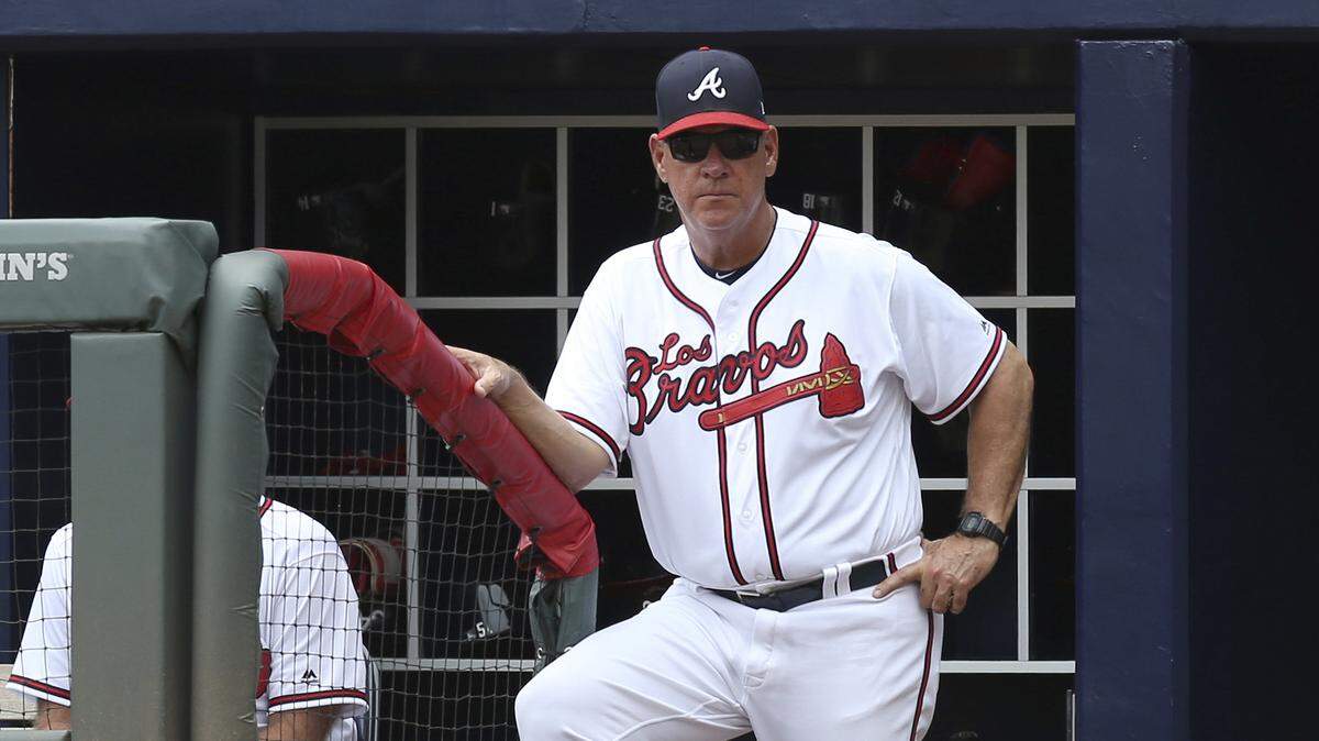 Atlanta Braves manager Brian Snitker watches from the dugout in the sixth inning of a game against the Washington Nationals on Sept. 16.