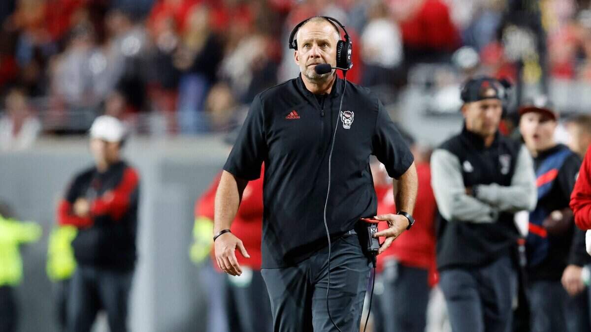 N.C. State head coach Dave Doeren walks the sidelines during the first half of N.C. State’s game against Florida State at Carter-Finley Stadium in Raleigh, N.C., Saturday, Oct. 8, 2022.