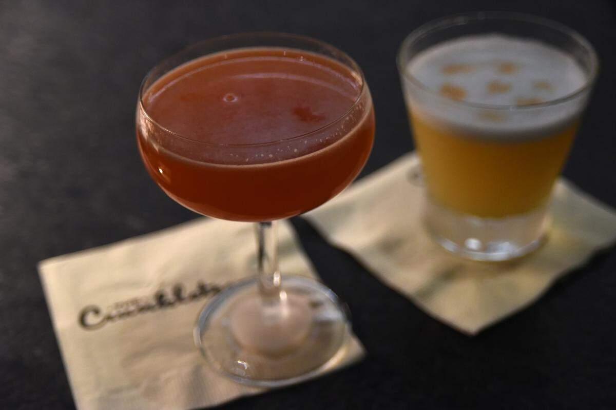 The Paper Plane, a high proof bourbon cocktail, left, and a Mezcal Sour, right, are two of the cocktails on the opening menu of The Crunkleton in Raleigh.