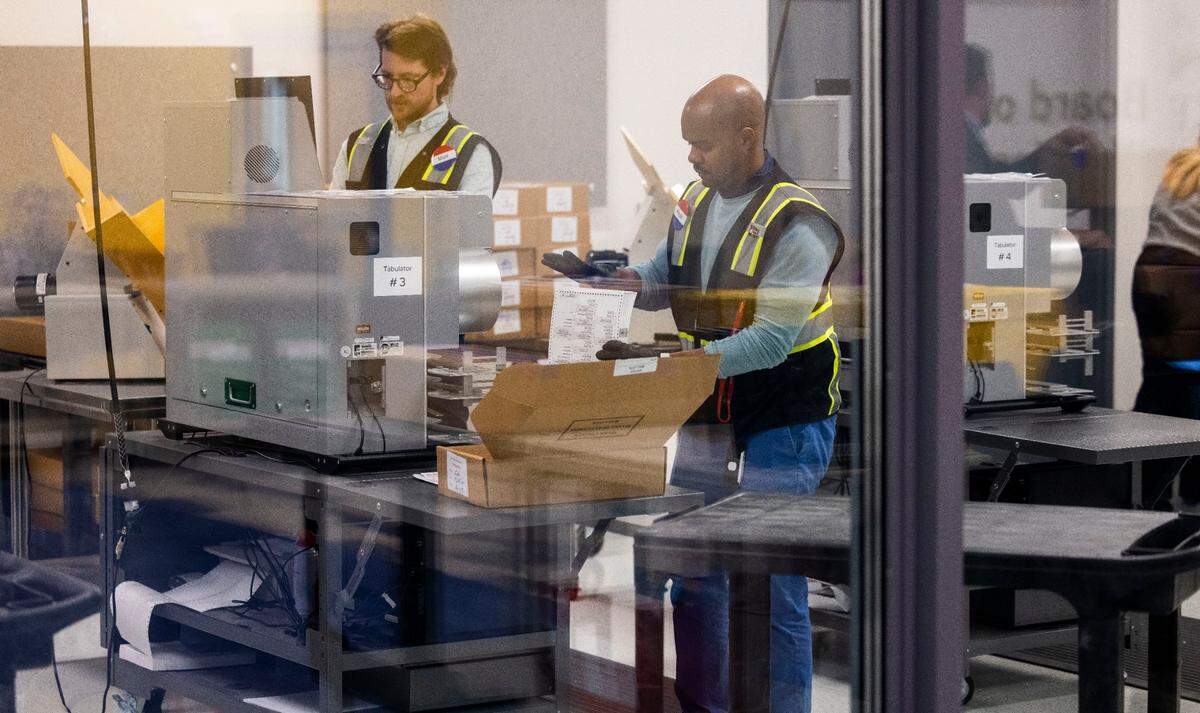 Wake County Board of Elections employees process ballots from the 2024 election on Wednesday, Nov. 13, 2024, in Raleigh, N.C.