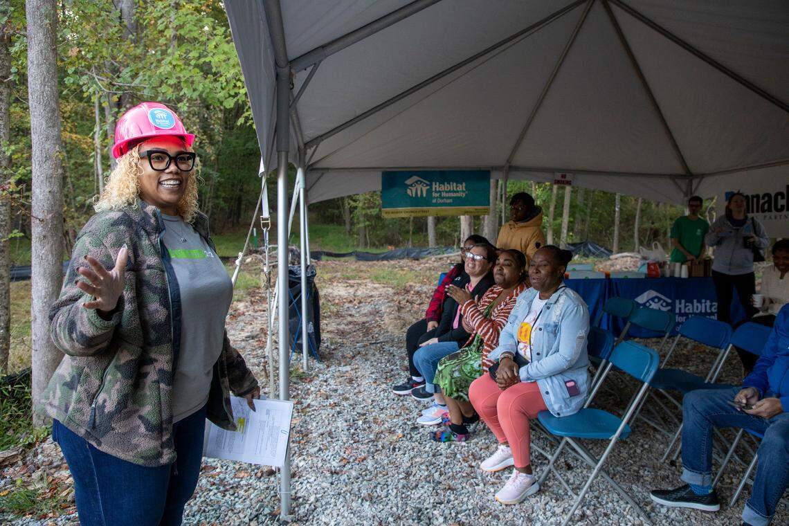 Habitat CEO Tiana Joyner speaks to volunteers at the group’s “Builders Blitz” earlier this year.