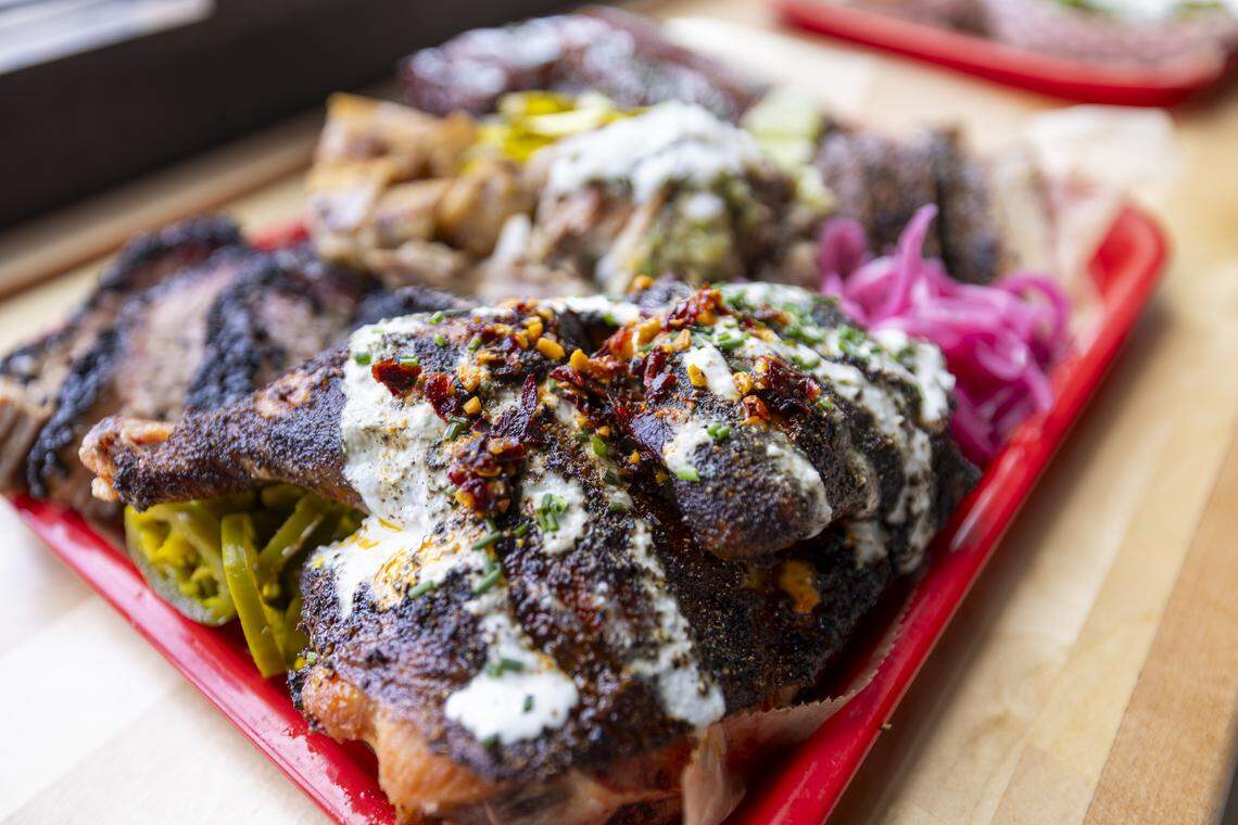 A tray of barbecued meats at Lawrence Barbecue on Thursday, Sept. 11, 2025, ahead of the grand opening of the restaurant’s new downtown Cary location on Cedar Street. Lawrence Barbecue relocated to the 4,900-square-foot Cary space from Boxyard RTP, a shipping container food hall in Research Triangle Park.