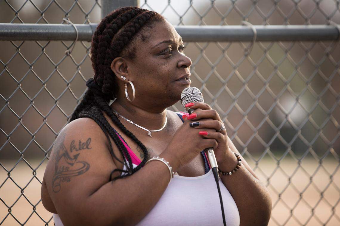 Rolanda Byrd cries as she speaks to community members at Chavis Park on Wednesday, March 11, 2020 about the impact of a Raleigh police officer involved shooting that drew hundreds of people to a protest downtown late Tuesday night and early Wednesday. Byrd’s son Akiel Denkins was shot and killed by police in February 2016.