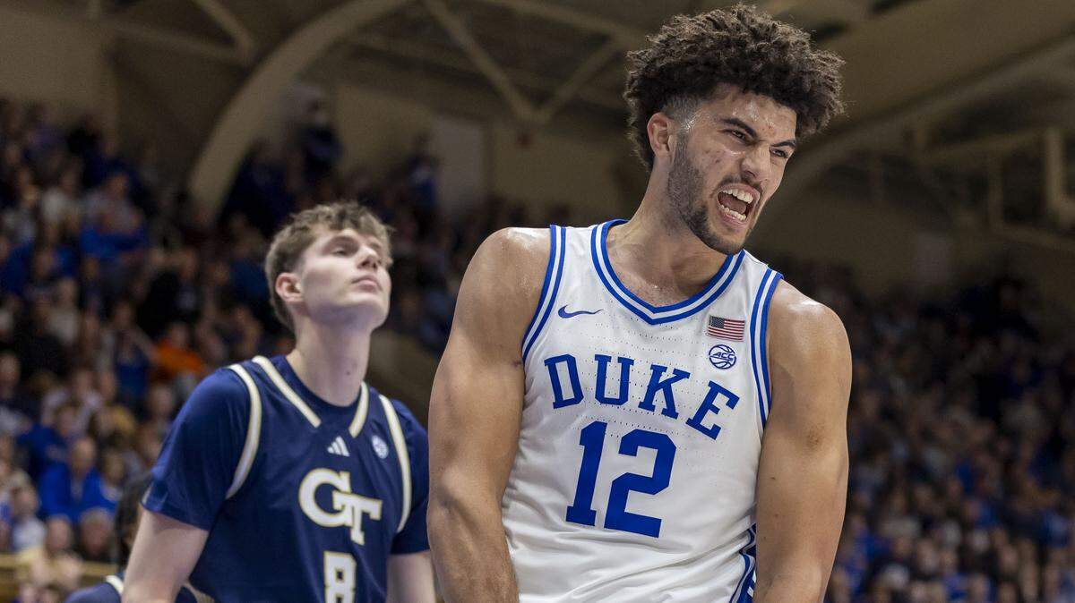 Duke forward Cameron Boozer (12) reacts after scoring a basket and drawing a foul in the second half against Georgia Tech on Wednesday, December 31, 2025 at Cameron Indoor Stadium in Durham, N.C. Boozer lead all scores with 26 points in the Blue Devils’ 85-79 victory.