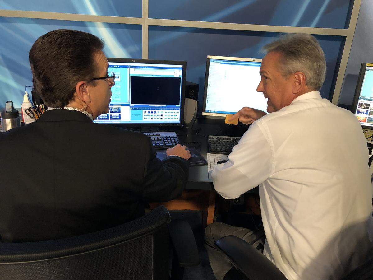 ABC11 meteorologist Steve Stewart and chief meteorologist Chris Hohmann discuss graphics before beginning wall-to-wall coverage of Hurricane Florence on Sept. 13, 2018.