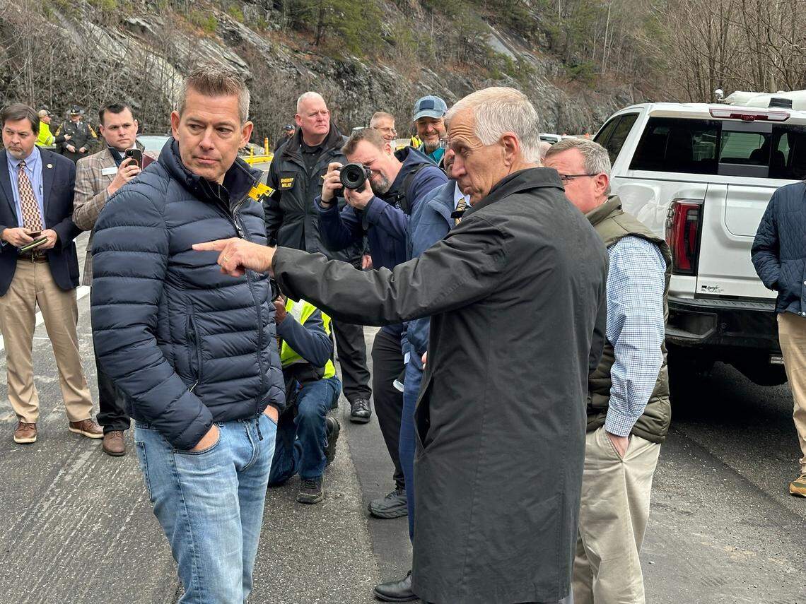 U.S. Sen. Thom Tillis, right, speaks with U.S. Transportation Secretary Sean Duffy during a visit to the damaged section of Interstate 40 in Pigeon River Gorge near the Tennessee state line on Monday, Feb. 10, 2025. Duffy also met briefly with Gov. Josh Stein and N.C. Transportation Secretary Joey Hopkins.