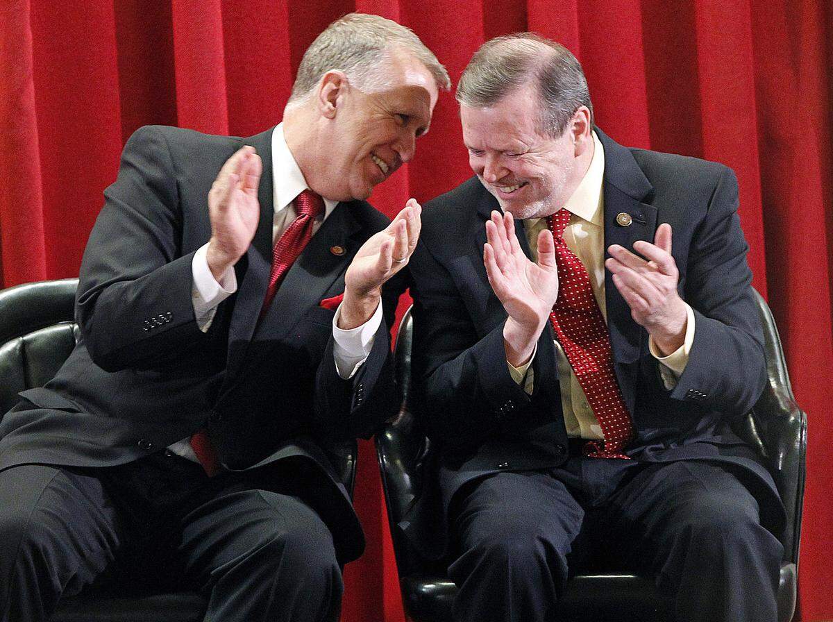 Then-House Speaker Thom Tillis, left, and Senate leader Phil Berger applaud during Gov. Pat McCrory’s State of the State address Feb. 16, 2013, in the House chambers at the state Legislative Building in Raleigh.