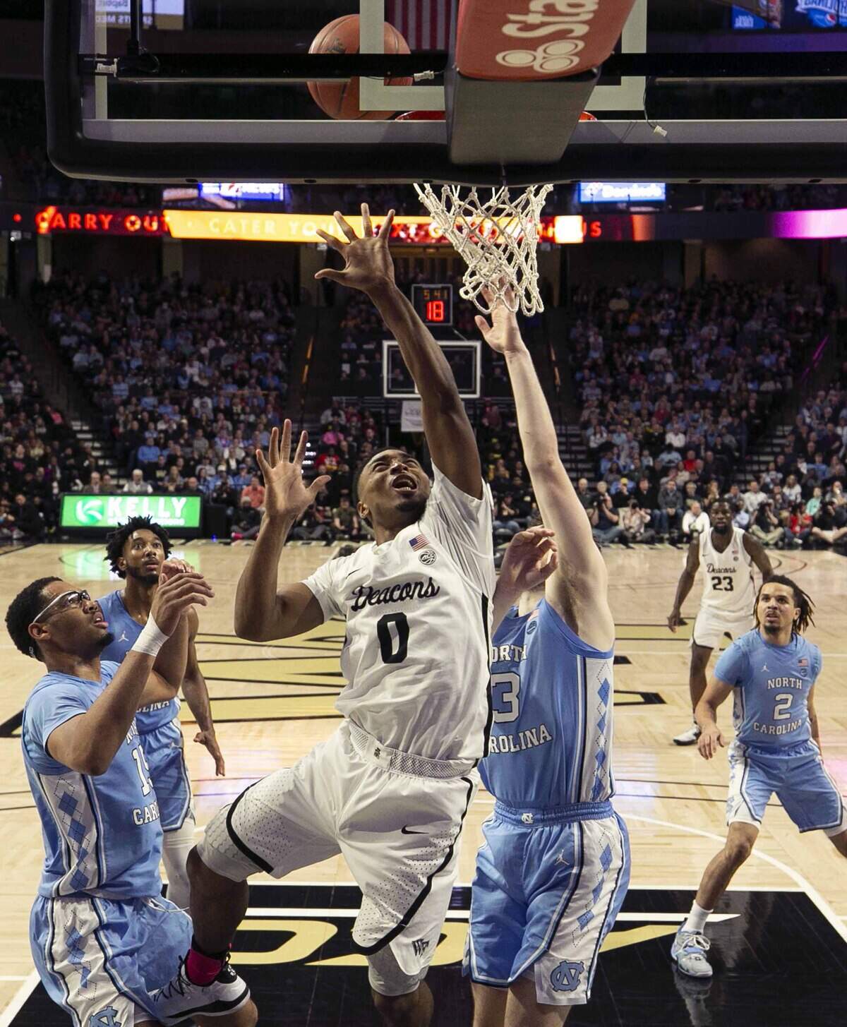 Wake Forest’s Brandon Childress (0) drives to the basket for two of his 14 points in the first half against North Carolina on Tuesday, February 11, 2020 at Lawrence Joel Coliseum in Winston-Salem, N.C.