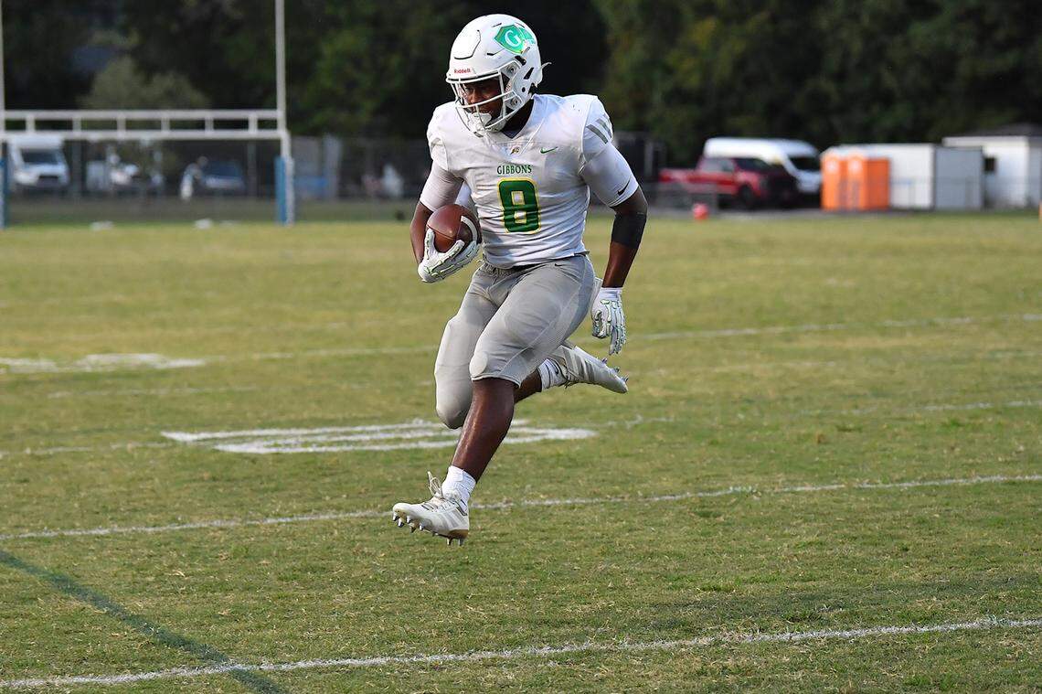 Cardinal Gibbons running back Noah Terry (8) leaps over the goal line for the touchdown against Southeast Raleigh during the first half. The Southeast Raleigh Bulldogs and the Cardinal Gibbons Crusaders met in a non-conference football game in Raleigh, N.C. September 12, 2025