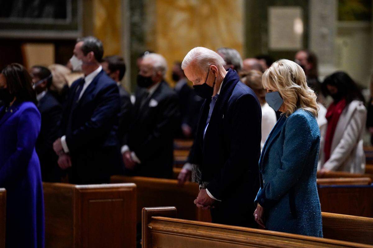 President-elect Joe Biden and his wife Jill Biden attend Mass at the Cathedral of St. Matthew the Apostle during Inauguration Day ceremonies Wednesday, Jan. 20, 2021, in Washington.
