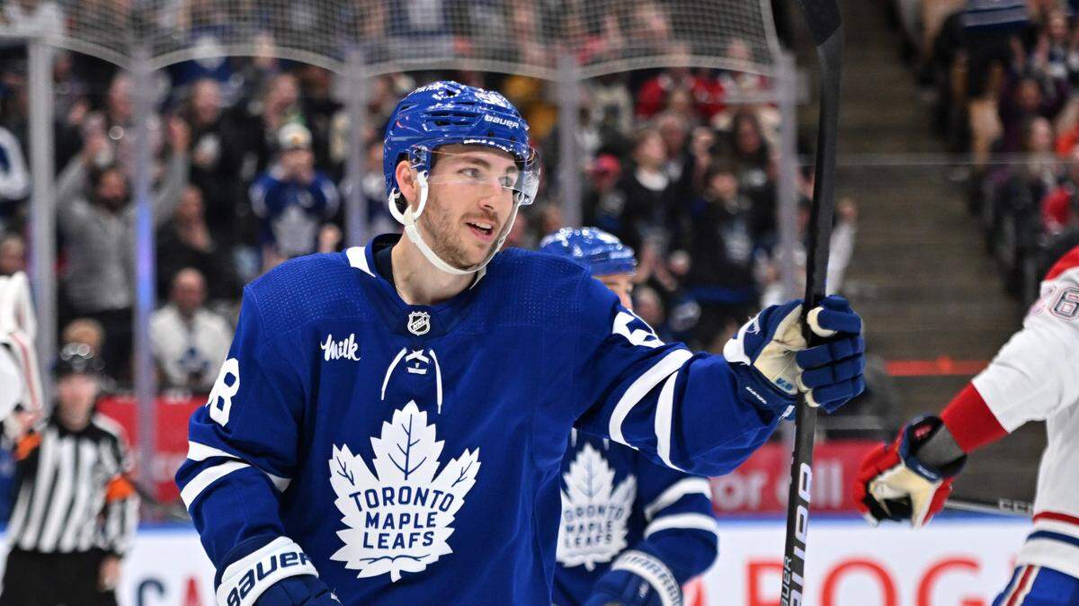 Toronto Maple Leafs forward Michael Bunting (58) celebrates after scoring a goal against the Montreal Canadiens in the third period at Scotiabank Arena.
