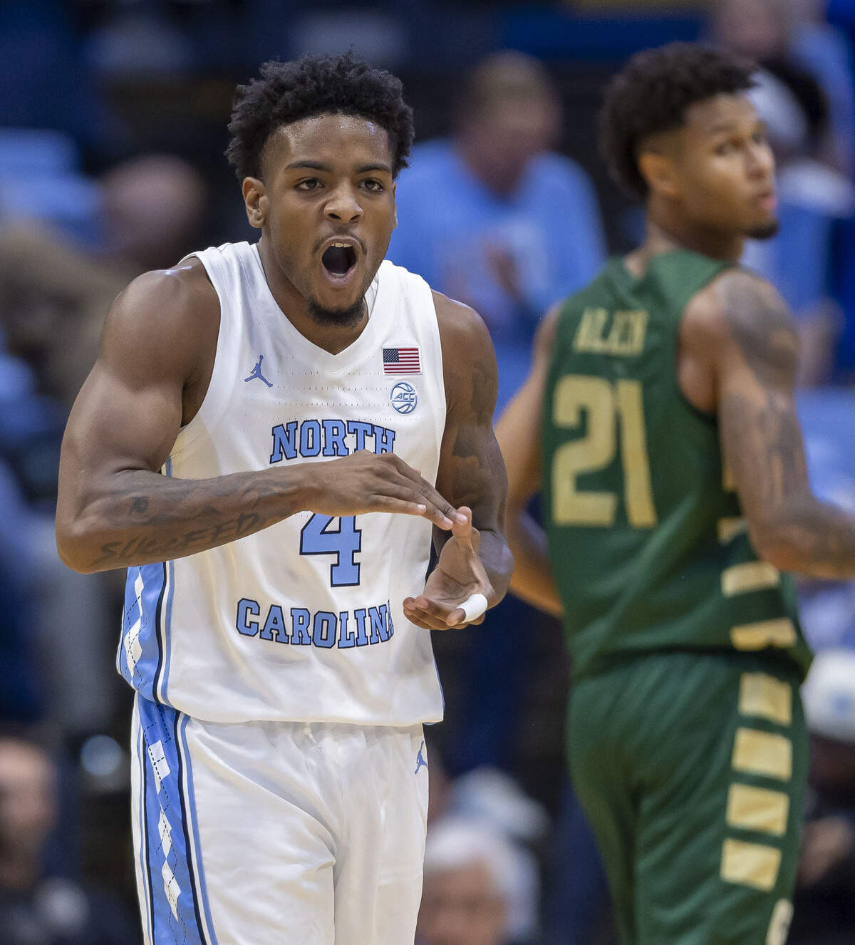 North Carolina guard Jaydon Young (4) reacts after sinking a three-point basket to tie UNC-Charlotte 45-45 in the second half on Tuesday, October 27, 2026 at the Smith Center in Chapel Hill, N.C.