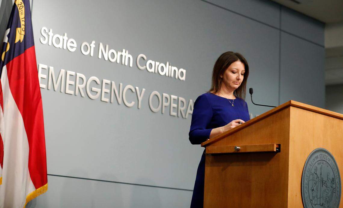 N.C. Department of Health and Human Services Secretary Dr. Mandy Cohen listens to a question during a briefing at the Emergency Operations Center in Raleigh, N.C., Thursday, Dec. 10, 2020.