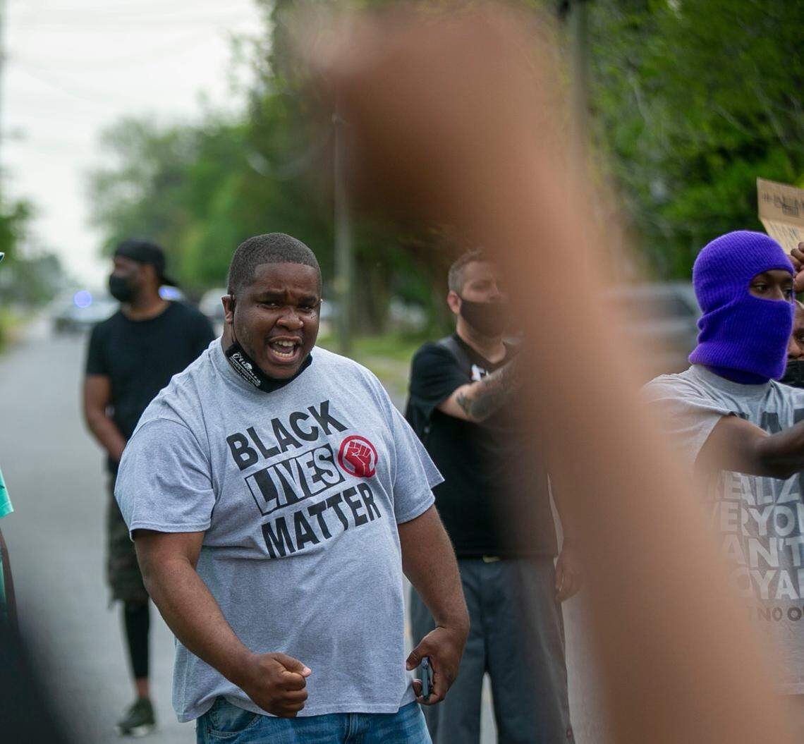 Elizabeth City Councilman Gabriel Adkins leads demonstrators on a march through Andrew Browns neighborhood on Thursday, April 29, 2021 in Elizabeth City, N.C. This is the ninth day of demonstrations in the wake of Andrew Brown Jr.s death at the hands of Pasquotank County deputies.